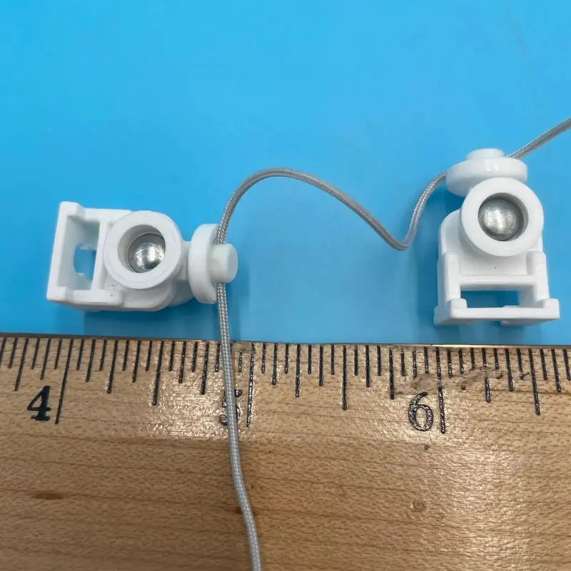 Ripplefold Carriers 80% Fullness, 2-3/8" Spacing - 500 Carriers/Roll K82080025White